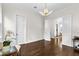 Bright office featuring hardwood floors, stylish light fixture, white trim and doors at 2941 Lookout Ne Pl, Atlanta, GA 30305
