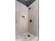 Beautiful shower with modern tile and bronze fixtures at 2941 Lookout Ne Pl, Atlanta, GA 30305