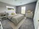 Bright bedroom featuring a king-size bed and calming decor at 4369 Estate St, South Fulton, GA 30349