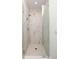 Elegant shower features marble tiling, glass enclosure, and modern fixtures at 10939 Serenbe Ln, Chattahoochee Hills, GA 30268