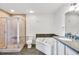 Bathroom with a shower, jacuzzi tub, and dual sinks at 285 Centennial Olympic Park Nw Dr # 903, Atlanta, GA 30313