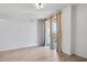 Bright bedroom featuring wood-look floors, neutral walls, and large windows with natural light at 285 Centennial Olympic Park Nw Dr # 903, Atlanta, GA 30313