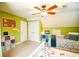 Bedroom with green walls, twin beds, and ample closet space at 160 Edgewater Trl, Fayetteville, GA 30215