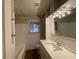 Clean bathroom, featuring updated vanity and shower/tub combo at 1885 Broad Ave, East Point, GA 30344