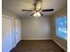 Well-lit bedroom with hardwood floors and ceiling fan at 1885 Broad Ave, East Point, GA 30344