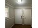 Bright entryway with hardwood floors and neutral walls at 1885 Broad Ave, East Point, GA 30344