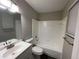 Clean bathroom with bathtub and updated vanity at 5914 Sara Ashley Ct, Lithonia, GA 30058