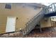Back exterior showing stairs leading to deck at 5914 Sara Ashley Ct, Lithonia, GA 30058