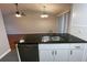 Modern kitchen with granite countertops and stainless steel dishwasher at 5914 Sara Ashley Ct, Lithonia, GA 30058