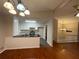 Modern kitchen featuring granite countertops, updated appliances, and white cabinetry at 5914 Sara Ashley Ct, Lithonia, GA 30058