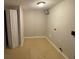 Basement laundry room with built-in shelving at 5914 Sara Ashley Ct, Lithonia, GA 30058