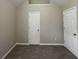 Spacious bedroom with double closets and neutral decor at 3063 Stonebridge Creek Dr, Lithonia, GA 30058