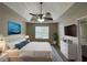 Spacious main bedroom with a king-size bed and en-suite bathroom at 3063 Stonebridge Creek Dr, Lithonia, GA 30058