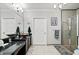 Elegant bathroom with a vessel sink, spacious vanity, modern fixtures, and a glass-enclosed shower at 424 Lake Point Trce, Canton, GA 30114