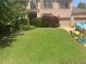 Charming brick two-story home with manicured lawn, shutters, and a two-car garage at 424 Lake Point Trce, Canton, GA 30114