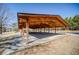 Wood-beamed picnic pavilion with ample seating and shaded areas, perfect for community events at 424 Lake Point Trce, Canton, GA 30114