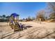 Vibrant community playground with play structures, slides, and swings amidst a sandy play area at 424 Lake Point Trce, Canton, GA 30114