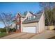 Attractive two-story home featuring a two-car garage and a combination of brick and siding at 75 Crestview Dr, Dallas, GA 30157