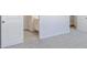 Bright bedroom with neutral carpeting and ensuite bathroom access at 214 Wilder Ridge Way, Lawrenceville, GA 30044
