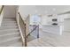 Open concept kitchen with island and stainless steel appliances at 214 Wilder Ridge Way, Lawrenceville, GA 30044