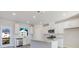 Spacious kitchen with white cabinets, granite countertops, and stainless steel appliances at 214 Wilder Ridge Way, Lawrenceville, GA 30044
