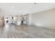 Open concept living area with kitchen and stairs to upper level at 214 Wilder Ridge Way, Lawrenceville, GA 30044