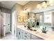Bathroom featuring double vanity, modern fixtures, and sleek tile floors at 723 Crossroad Ct, Powder Springs, GA 30127