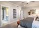 Beautiful bedroom featuring stylish decor, carpet floors, and bright windows at 723 Crossroad Ct, Powder Springs, GA 30127