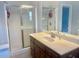 Bathroom featuring vanity with a shower, combining style with modern convenience at 815 Sylvan Dr, Marietta, GA 30066