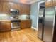 Well-equipped kitchen with stainless steel appliances, ample cabinetry, and hardwood floors at 815 Sylvan Dr, Marietta, GA 30066
