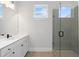 Modern bathroom featuring a large shower and white vanity at 320 Gray Shingle Ln, Woodstock, GA 30189