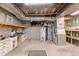An unfinished basement with utilities, work bench and concrete flooring at 7300 Chattahoochee Bluff Dr, Atlanta, GA 30350