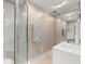 A full bathroom with a walk-in shower, vanity, and tile flooring at 7300 Chattahoochee Bluff Dr, Atlanta, GA 30350