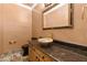 Stylish powder room featuring a vessel sink, granite countertop, and modern fixtures at 7300 Chattahoochee Bluff Dr, Atlanta, GA 30350