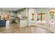 Bright kitchen featuring green custom cabinets and stainless steel appliances at 7300 Chattahoochee Bluff Dr, Atlanta, GA 30350