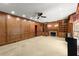 Elegant living room features a fireplace, custom built-ins, and comfortable carpeting at 7300 Chattahoochee Bluff Dr, Atlanta, GA 30350