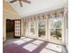 Sunroom with large windows offering scenic outdoor views at 7300 Chattahoochee Bluff Dr, Atlanta, GA 30350