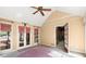 Bright sunroom with multiple windows offering natural light and views of the outdoors at 7300 Chattahoochee Bluff Dr, Atlanta, GA 30350