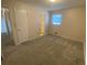 Bedroom with a view to an ensuite bathroom and a hallway at 2787 Heritage Ln, Morrow, GA 30260