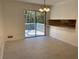 Bright dining area with large windows and a view of the deck, tiled floors at 2787 Heritage Ln, Morrow, GA 30260