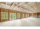 Unfinished basement with multiple windows and door leading to the outside, ready for customization at 729 Keystone Dr, Woodstock, GA 30188