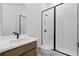 Modern bathroom featuring a glass shower, stylish vanity, and sleek fixtures at 729 Keystone Dr, Woodstock, GA 30188