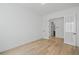 Bright bedroom with hardwood floors and french doors at 729 Keystone Dr, Woodstock, GA 30188