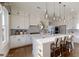 Stylish kitchen with a large island, stainless steel appliances, and a cozy breakfast nook at 729 Keystone Dr, Woodstock, GA 30188