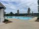 Community swimming pool featuring multiple lanes for swimming and spacious deck at 729 Keystone Dr, Woodstock, GA 30188