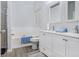 Bright bathroom with double sink vanity, soaking tub, separate shower, and updated fixtures at 6427 Grey Fox Way, Riverdale, GA 30296