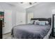 Serene bedroom with a queen-sized bed, ample closet space, and neutral color scheme at 6427 Grey Fox Way, Riverdale, GA 30296