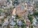 Aerial view of an estate with a pool, tennis court, and lush landscaping at 420 Argonne Nw Dr, Atlanta, GA 30305