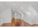 Finished bonus room featuring hardwood floors, recessed lights, and closet space at 420 Argonne Nw Dr, Atlanta, GA 30305