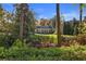 Majestic two-story home featuring a manicured front lawn and lush landscaping at 420 Argonne Nw Dr, Atlanta, GA 30305